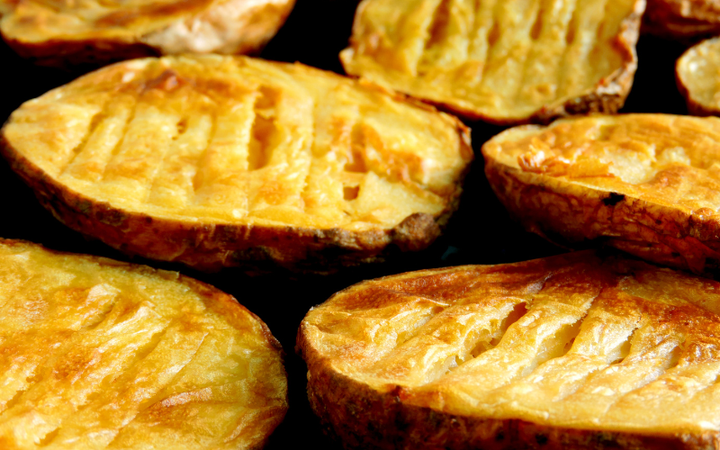 Baked potato sliced in half 