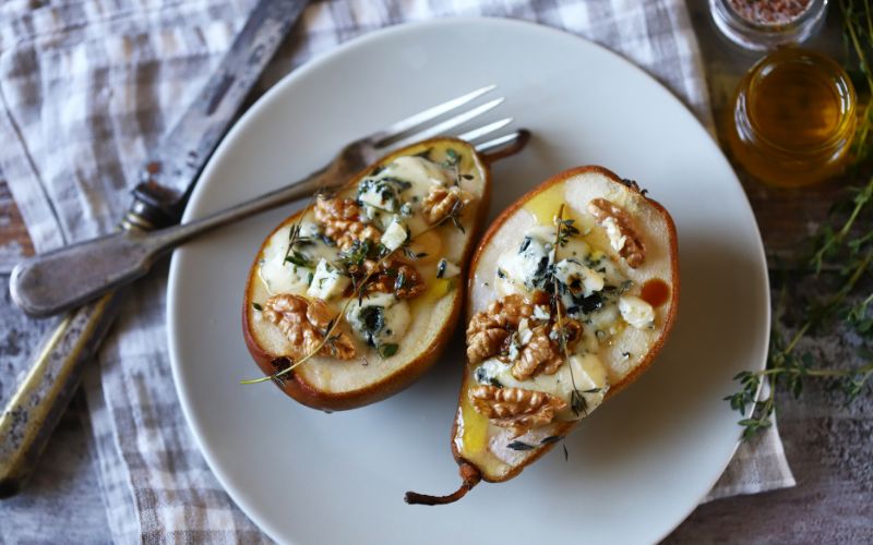 My kitchen philosophy is simple: good recipes are worth repeating. The simple desert of Roasted Pears with Blue Cheese and Honey- is honest food that outlasts trends, from my cookbook and my own table.