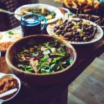 Table with salads, olives appetizers