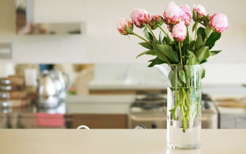 Flowers in a vase- the perfect hostess gift.