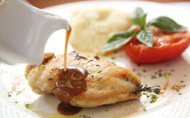 Sauce pan made from fond poured over chicken
