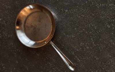 Chef Alexis Hernandez’s longtime All-Clad sauté pan, featured in the story behind What the Pan Remembers
